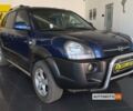 Синий Хендай Туксон, объемом двигателя 2 л и пробегом 229 тыс. км за 7350 $, фото 1 на Automoto.ua