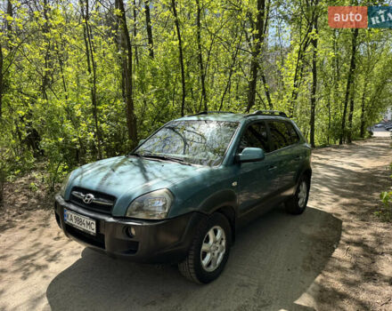 Синий Хендай Туксон, объемом двигателя 1.99 л и пробегом 272 тыс. км за 6800 $, фото 3 на Automoto.ua