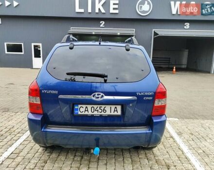 Синий Хендай Туксон, объемом двигателя 1.99 л и пробегом 225 тыс. км за 8000 $, фото 19 на Automoto.ua