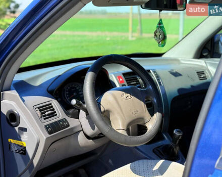 Синий Хендай Туксон, объемом двигателя 2 л и пробегом 320 тыс. км за 6300 $, фото 14 на Automoto.ua