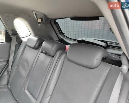 Синий Хендай Туксон, объемом двигателя 1.99 л и пробегом 225 тыс. км за 8000 $, фото 13 на Automoto.ua