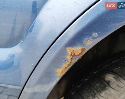 Синий Хендай Туксон, объемом двигателя 1.99 л и пробегом 225 тыс. км за 8000 $, фото 23 на Automoto.ua