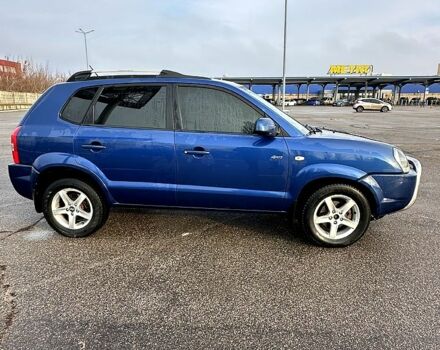 Синий Хендай Туксон, объемом двигателя 2 л и пробегом 224 тыс. км за 8300 $, фото 1 на Automoto.ua