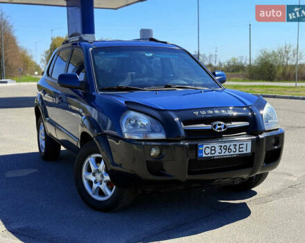 Синий Хендай Туксон, объемом двигателя 2 л и пробегом 320 тыс. км за 6300 $, фото 5 на Automoto.ua