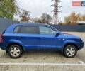 Синий Хендай Туксон, объемом двигателя 1.99 л и пробегом 225 тыс. км за 8000 $, фото 4 на Automoto.ua