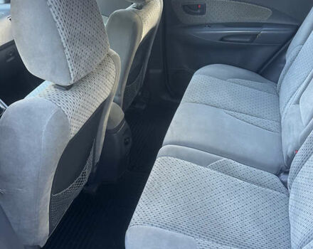 Синий Хендай Туксон, объемом двигателя 1.98 л и пробегом 218 тыс. км за 7300 $, фото 9 на Automoto.ua