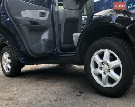 Синий Хендай Туксон, объемом двигателя 1.99 л и пробегом 315 тыс. км за 6700 $, фото 11 на Automoto.ua