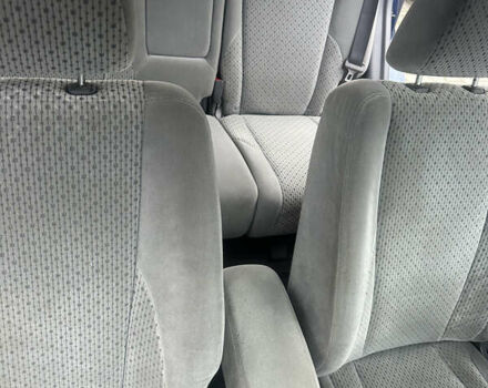 Синий Хендай Туксон, объемом двигателя 1.98 л и пробегом 218 тыс. км за 7300 $, фото 7 на Automoto.ua