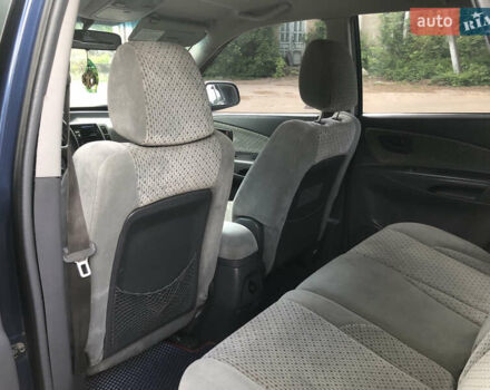 Синий Хендай Туксон, объемом двигателя 1.99 л и пробегом 315 тыс. км за 6700 $, фото 13 на Automoto.ua