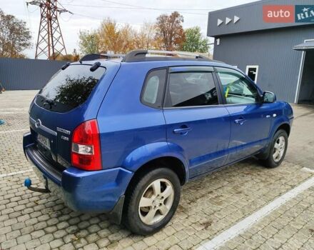 Синий Хендай Туксон, объемом двигателя 1.99 л и пробегом 225 тыс. км за 8000 $, фото 5 на Automoto.ua