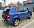 Синий Хендай Туксон, объемом двигателя 1.99 л и пробегом 225 тыс. км за 8000 $, фото 5 на Automoto.ua