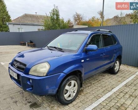 Синий Хендай Туксон, объемом двигателя 1.99 л и пробегом 225 тыс. км за 8000 $, фото 7 на Automoto.ua