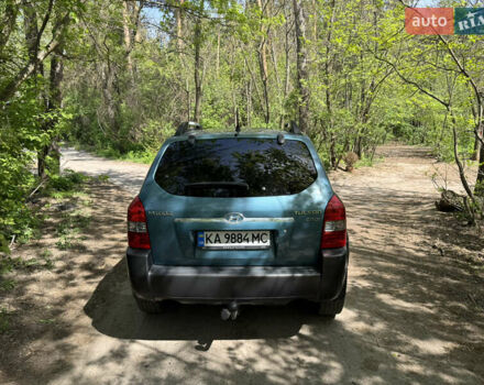 Синий Хендай Туксон, объемом двигателя 1.99 л и пробегом 272 тыс. км за 6800 $, фото 6 на Automoto.ua