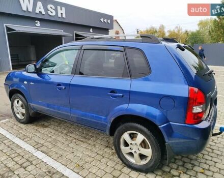 Синий Хендай Туксон, объемом двигателя 1.99 л и пробегом 225 тыс. км за 8000 $, фото 6 на Automoto.ua