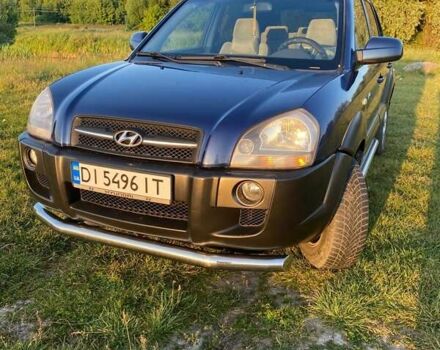 Синий Хендай Туксон, объемом двигателя 2 л и пробегом 215 тыс. км за 6600 $, фото 3 на Automoto.ua