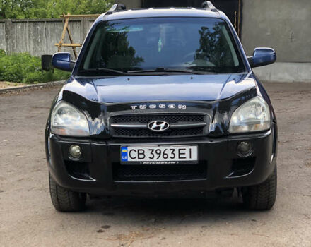 Синий Хендай Туксон, объемом двигателя 1.99 л и пробегом 315 тыс. км за 6700 $, фото 2 на Automoto.ua