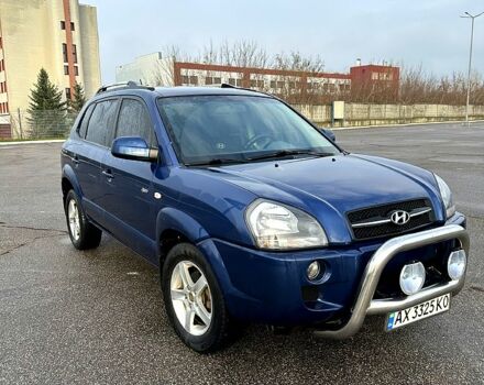 Синий Хендай Туксон, объемом двигателя 2 л и пробегом 224 тыс. км за 8300 $, фото 2 на Automoto.ua