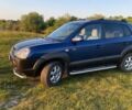 Синий Хендай Туксон, объемом двигателя 2 л и пробегом 215 тыс. км за 6600 $, фото 3 на Automoto.ua