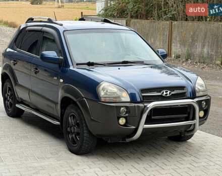 Синий Хендай Туксон, объемом двигателя 2.66 л и пробегом 320 тыс. км за 6300 $, фото 3 на Automoto.ua