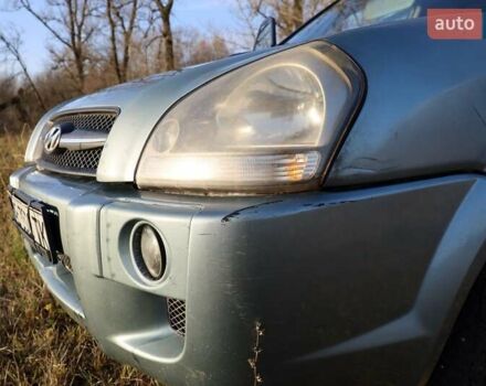 Синий Хендай Туксон, объемом двигателя 1.98 л и пробегом 280 тыс. км за 4800 $, фото 12 на Automoto.ua