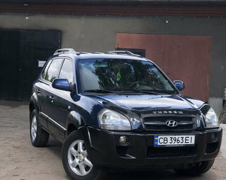 Синий Хендай Туксон, объемом двигателя 1.99 л и пробегом 315 тыс. км за 6700 $, фото 1 на Automoto.ua