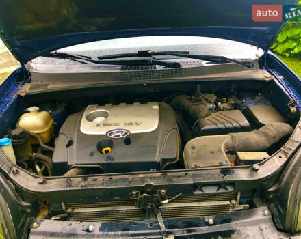 Синий Хендай Туксон, объемом двигателя 2 л и пробегом 320 тыс. км за 6300 $, фото 12 на Automoto.ua