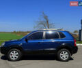 Синий Хендай Туксон, объемом двигателя 2 л и пробегом 320 тыс. км за 6300 $, фото 3 на Automoto.ua