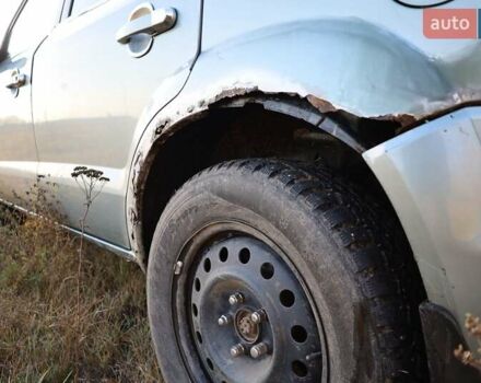 Синий Хендай Туксон, объемом двигателя 1.98 л и пробегом 280 тыс. км за 4800 $, фото 9 на Automoto.ua