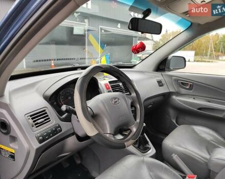 Синий Хендай Туксон, объемом двигателя 1.99 л и пробегом 225 тыс. км за 8000 $, фото 9 на Automoto.ua