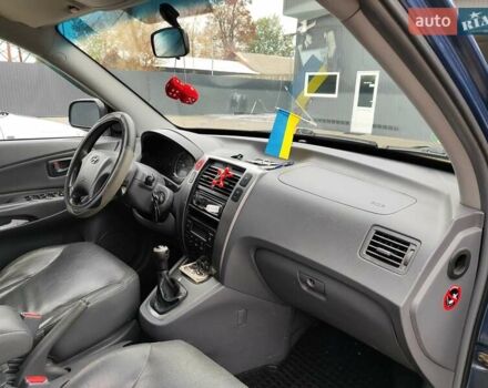 Синий Хендай Туксон, объемом двигателя 1.99 л и пробегом 225 тыс. км за 8000 $, фото 15 на Automoto.ua