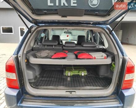 Синий Хендай Туксон, объемом двигателя 1.99 л и пробегом 225 тыс. км за 8000 $, фото 22 на Automoto.ua