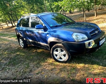 Синій Хендай Туксон, об'ємом двигуна 2 л та пробігом 227 тис. км за 7000 $, фото 1 на Automoto.ua