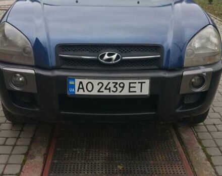 Синий Хендай Туксон, объемом двигателя 2.66 л и пробегом 320 тыс. км за 5500 $, фото 4 на Automoto.ua