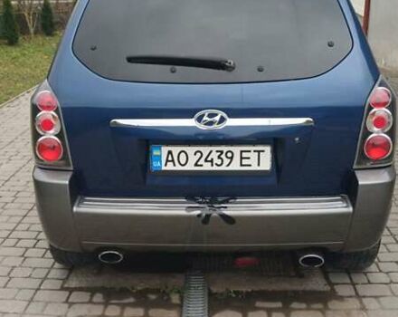 Синий Хендай Туксон, объемом двигателя 2.66 л и пробегом 320 тыс. км за 5500 $, фото 5 на Automoto.ua