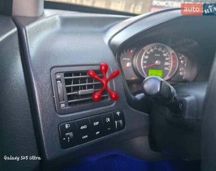 Синий Хендай Туксон, объемом двигателя 1.98 л и пробегом 187 тыс. км за 8400 $, фото 2 на Automoto.ua