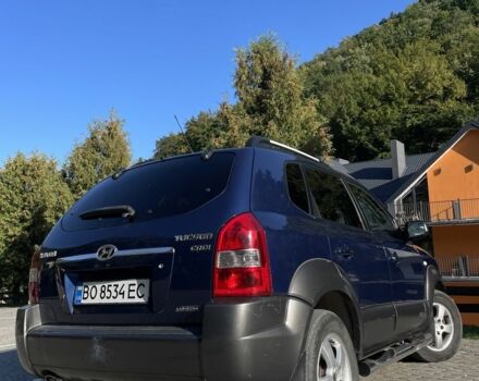 Синій Хендай Туксон, об'ємом двигуна 2 л та пробігом 244 тис. км за 6500 $, фото 4 на Automoto.ua