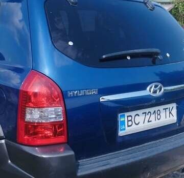 Синій Хендай Туксон, об'ємом двигуна 2 л та пробігом 350 тис. км за 7500 $, фото 3 на Automoto.ua