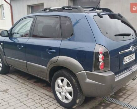 Синий Хендай Туксон, объемом двигателя 2.66 л и пробегом 320 тыс. км за 5500 $, фото 3 на Automoto.ua