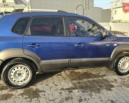 Синий Хендай Туксон, объемом двигателя 1.99 л и пробегом 313 тыс. км за 6000 $, фото 25 на Automoto.ua