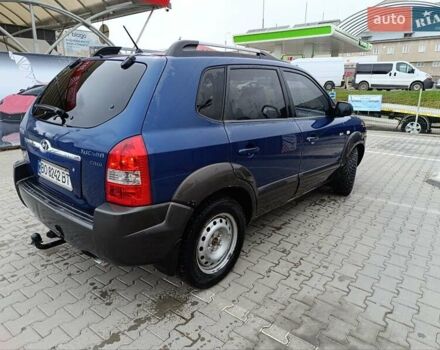 Синий Хендай Туксон, объемом двигателя 2 л и пробегом 314 тыс. км за 6700 $, фото 9 на Automoto.ua