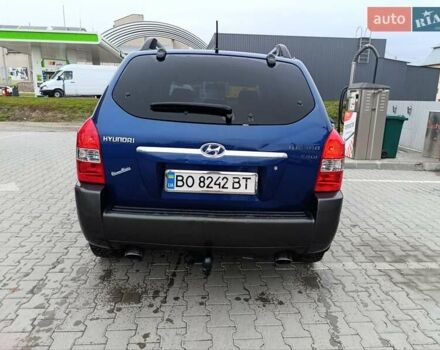 Синий Хендай Туксон, объемом двигателя 2 л и пробегом 314 тыс. км за 6700 $, фото 5 на Automoto.ua