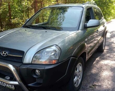 Синій Хендай Туксон, об'ємом двигуна 2 л та пробігом 288 тис. км за 7600 $, фото 5 на Automoto.ua