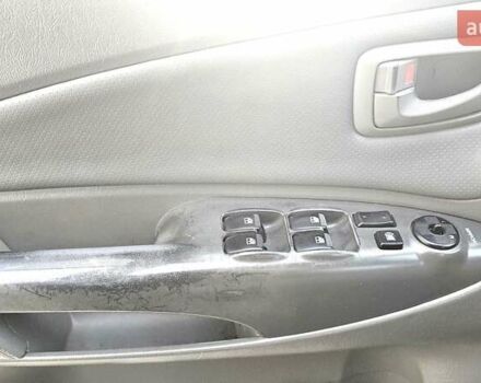 Синий Хендай Туксон, объемом двигателя 1.99 л и пробегом 313 тыс. км за 6000 $, фото 13 на Automoto.ua