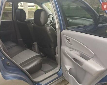 Синий Хендай Туксон, объемом двигателя 2.66 л и пробегом 320 тыс. км за 5500 $, фото 12 на Automoto.ua