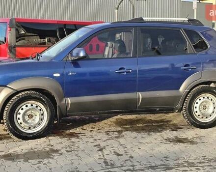 Синий Хендай Туксон, объемом двигателя 1.99 л и пробегом 313 тыс. км за 6000 $, фото 7 на Automoto.ua