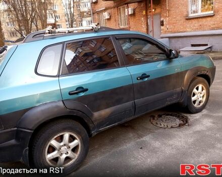 Синій Хендай Туксон, об'ємом двигуна 2 л та пробігом 273 тис. км за 4500 $, фото 2 на Automoto.ua