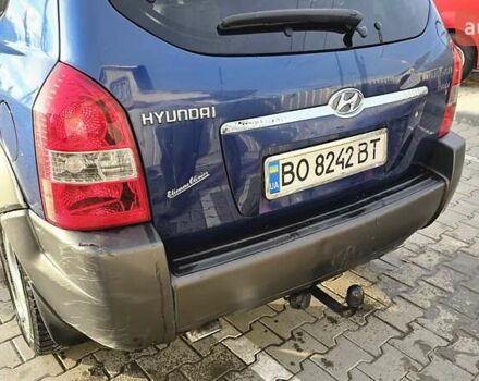 Синий Хендай Туксон, объемом двигателя 1.99 л и пробегом 313 тыс. км за 6000 $, фото 10 на Automoto.ua