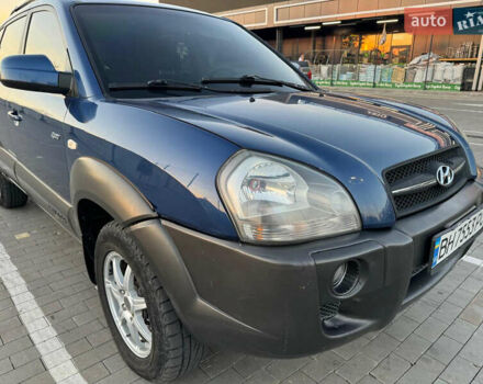 Синий Хендай Туксон, объемом двигателя 2 л и пробегом 206 тыс. км за 7800 $, фото 3 на Automoto.ua