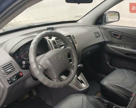 Синий Хендай Туксон, объемом двигателя 2.66 л и пробегом 320 тыс. км за 5500 $, фото 6 на Automoto.ua