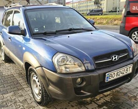 Синий Хендай Туксон, объемом двигателя 1.99 л и пробегом 313 тыс. км за 6000 $, фото 26 на Automoto.ua